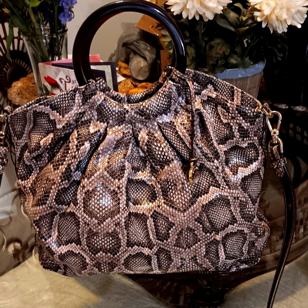 Brahmin pinkish look multi color!! Absolutely gorgeous bag ...